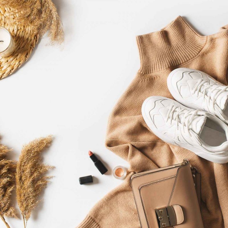 fashion-flat-lay-with-beige-caramel-sweater-casual-look-on-white-background.jpg