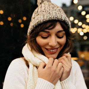 incredible-charming-lady-in-knitted-white-hat-and-knitted-sweater-smiling.jpg