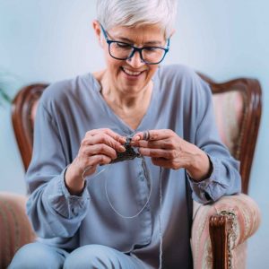 knitting-senior-woman-knitting-at-home-.jpg