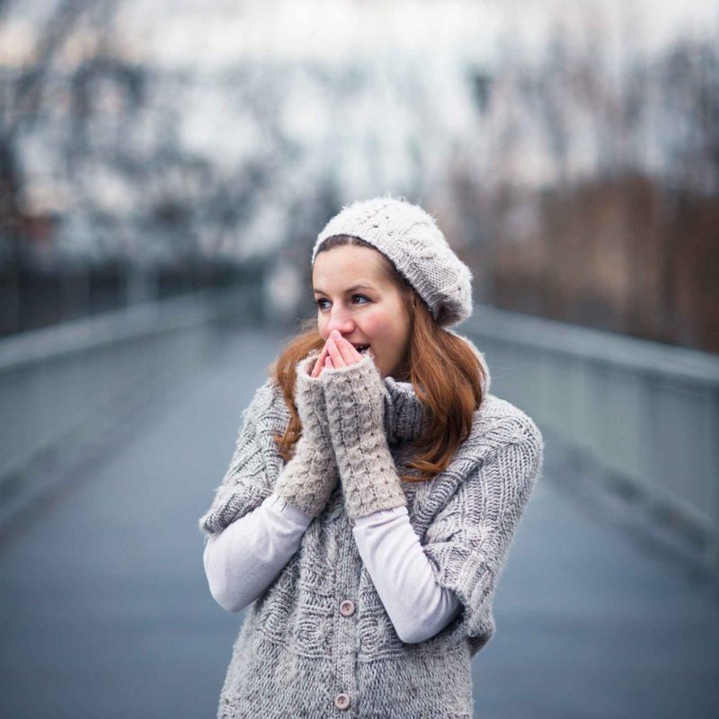 winter-portrait-young-woman-dressed-in-a-warm-woolen-car.jpg